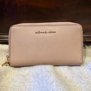 Michael Kor’s pink leather wallet